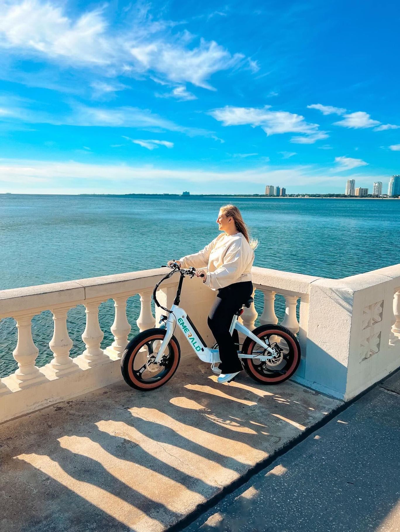 Woman with white emerald ebike.