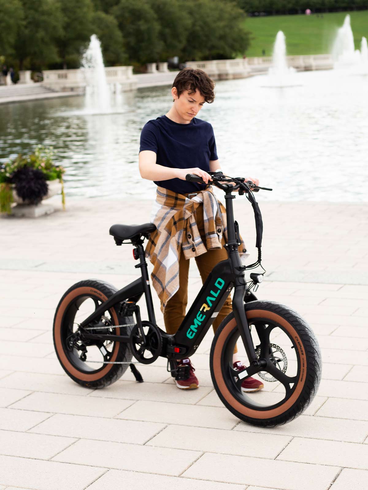 woman checking out here ebike's LED screen