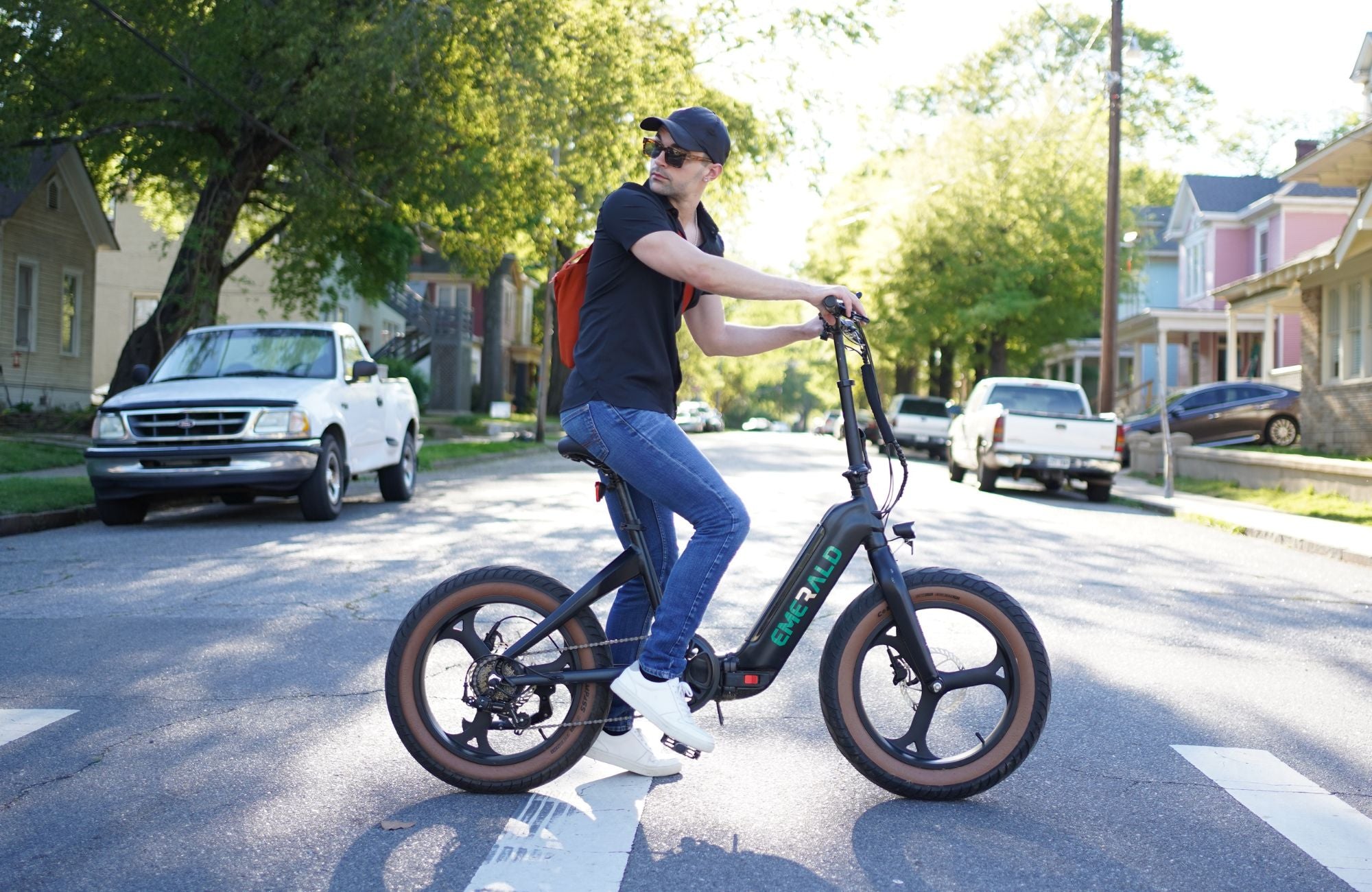 Man riding Emerald Ebike showcasing premium parts
