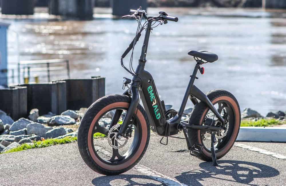 Emerald Ebike parked by a river