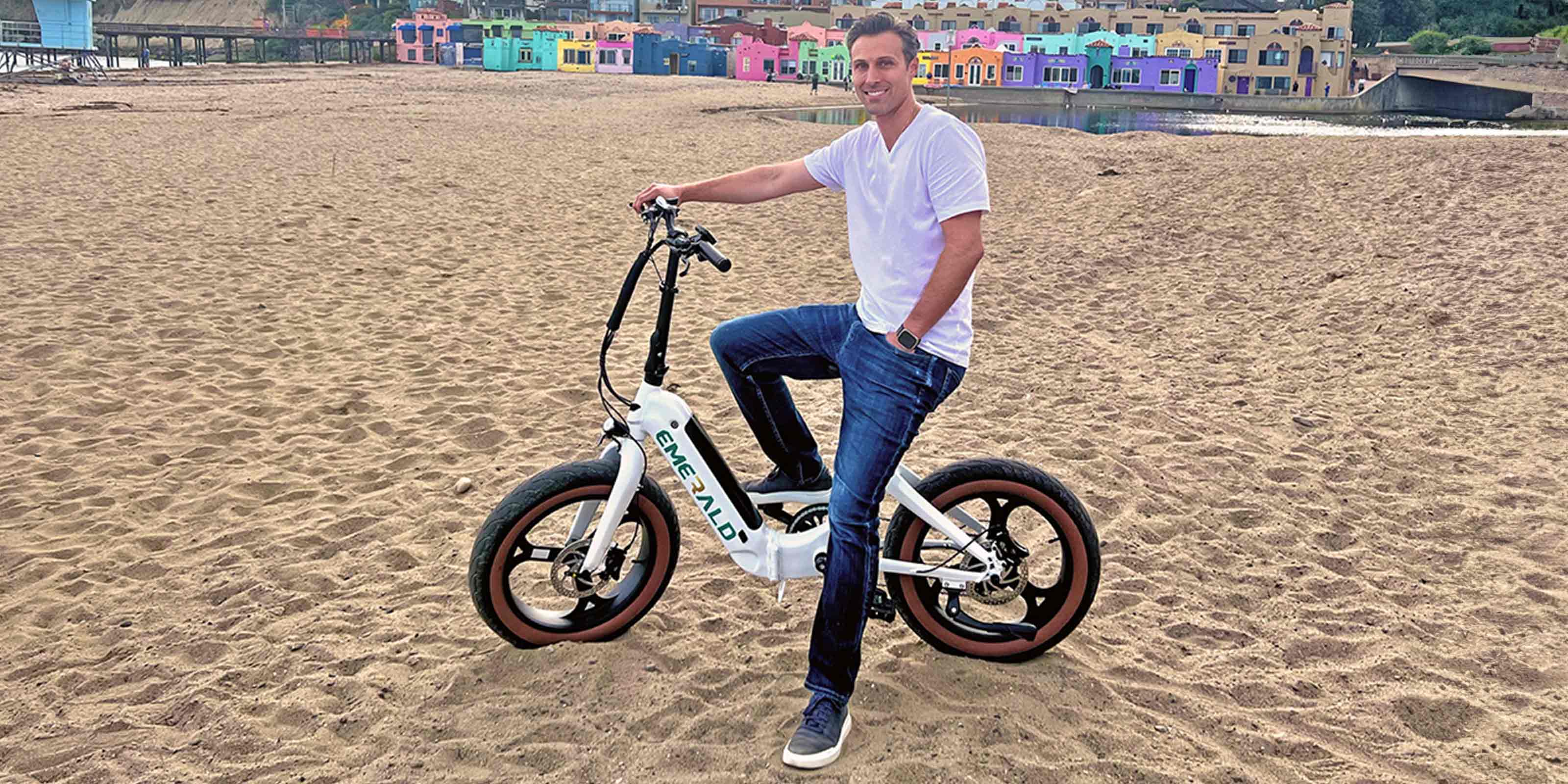 Man on the Emerald E-bike on the beach